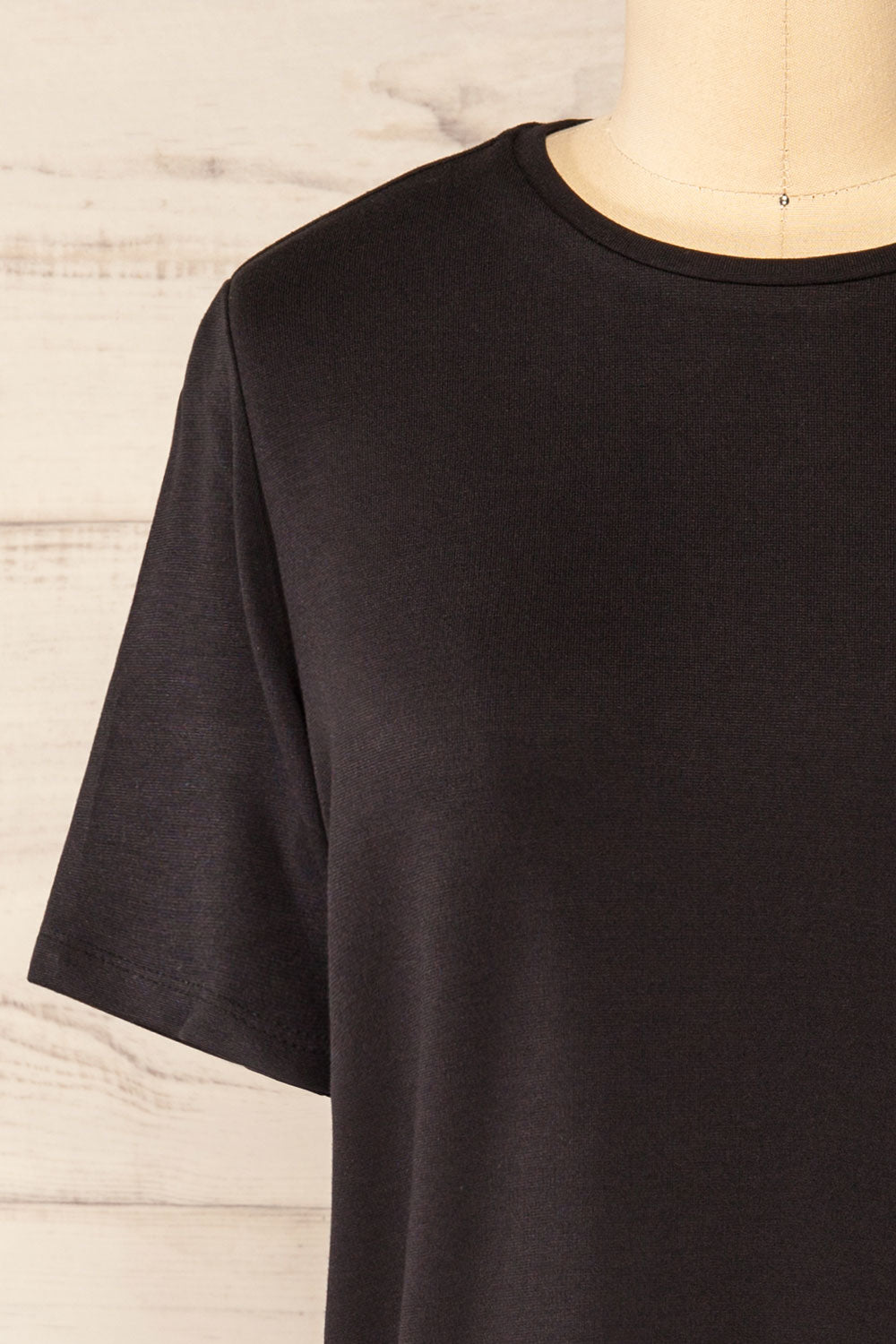 Wroc Black Round Neck T-Shirt | La petite garçonne front close-up