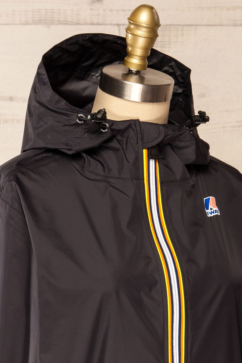 Zamora Black Packable Rain Jacket | La petite garçonne side close-up