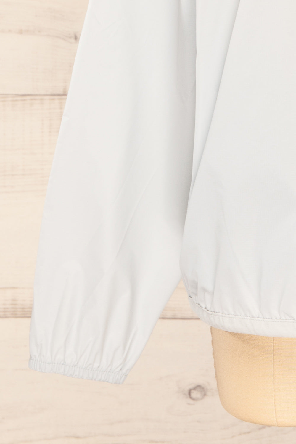 Zamora Grey Packable Rain Jacket | La petite garçonne bottom