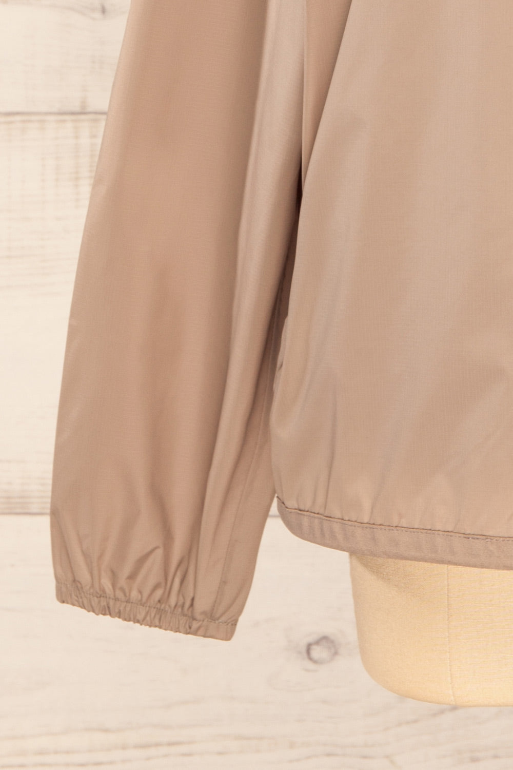 Zamora Taupe Packable Rain Jacket | La petite garçonne sleeve