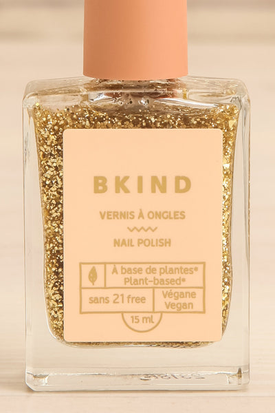 24K Clear Nail Polish w/ Gold Glitter | Maison garçonne close-up