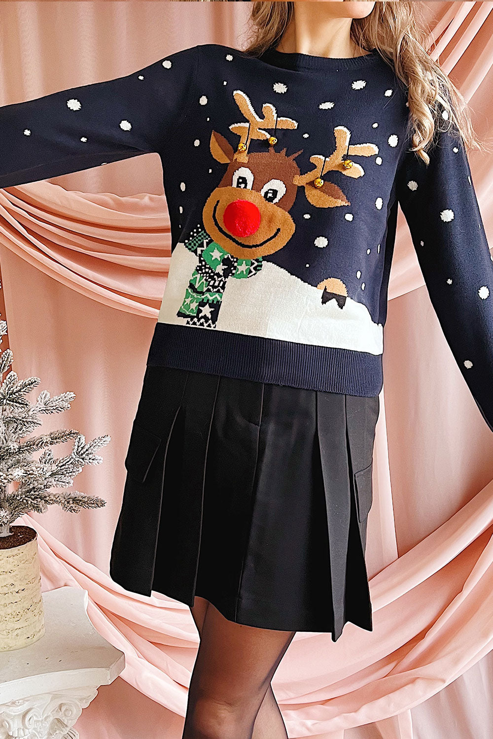 Woman wearing Renmark Navy Sweater with Reindeer from Boutique 1861 