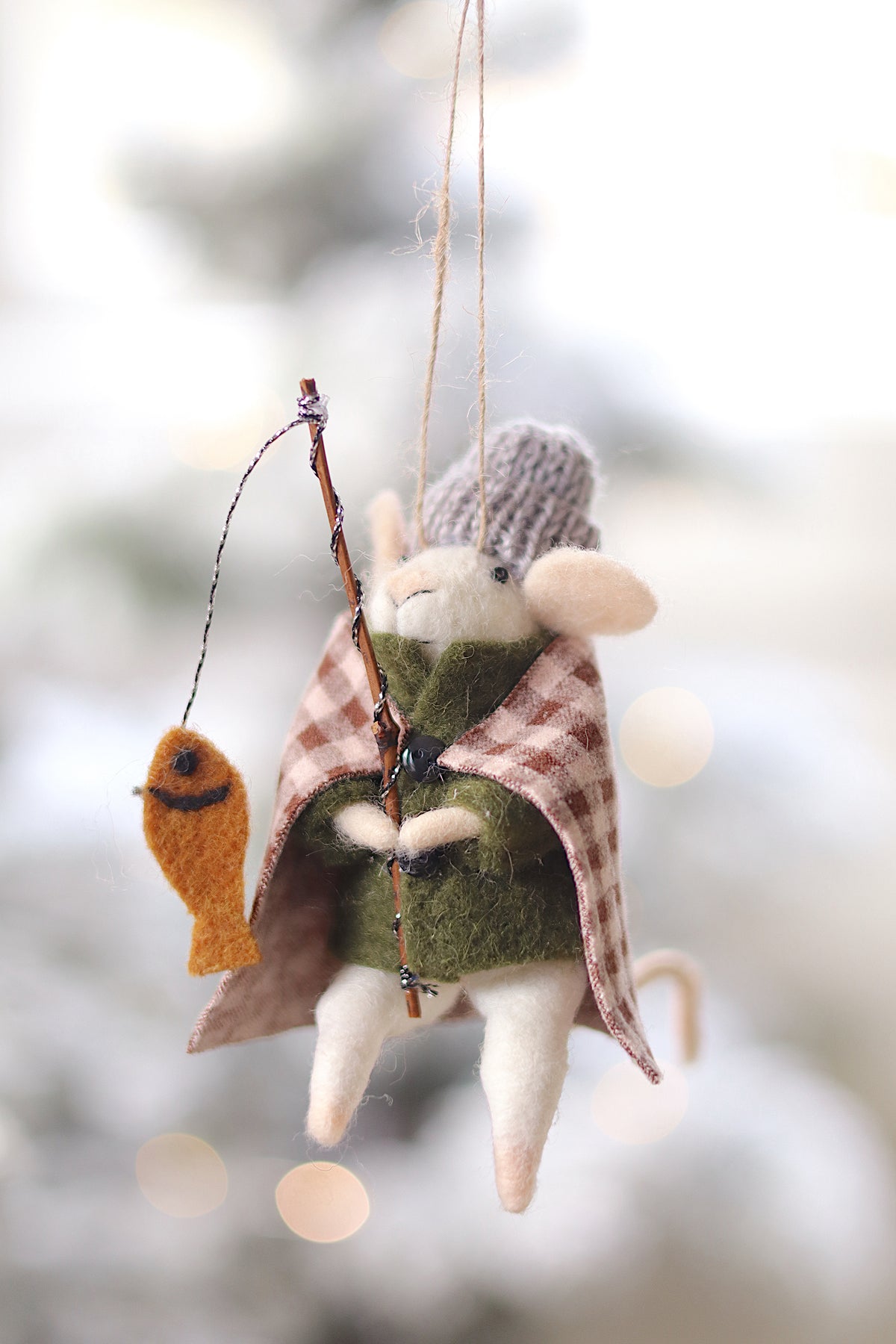 lifestyle view of ice fishing ivan Outdoor Holiday Mouse Ornament - 10 Options at Maison garçonne