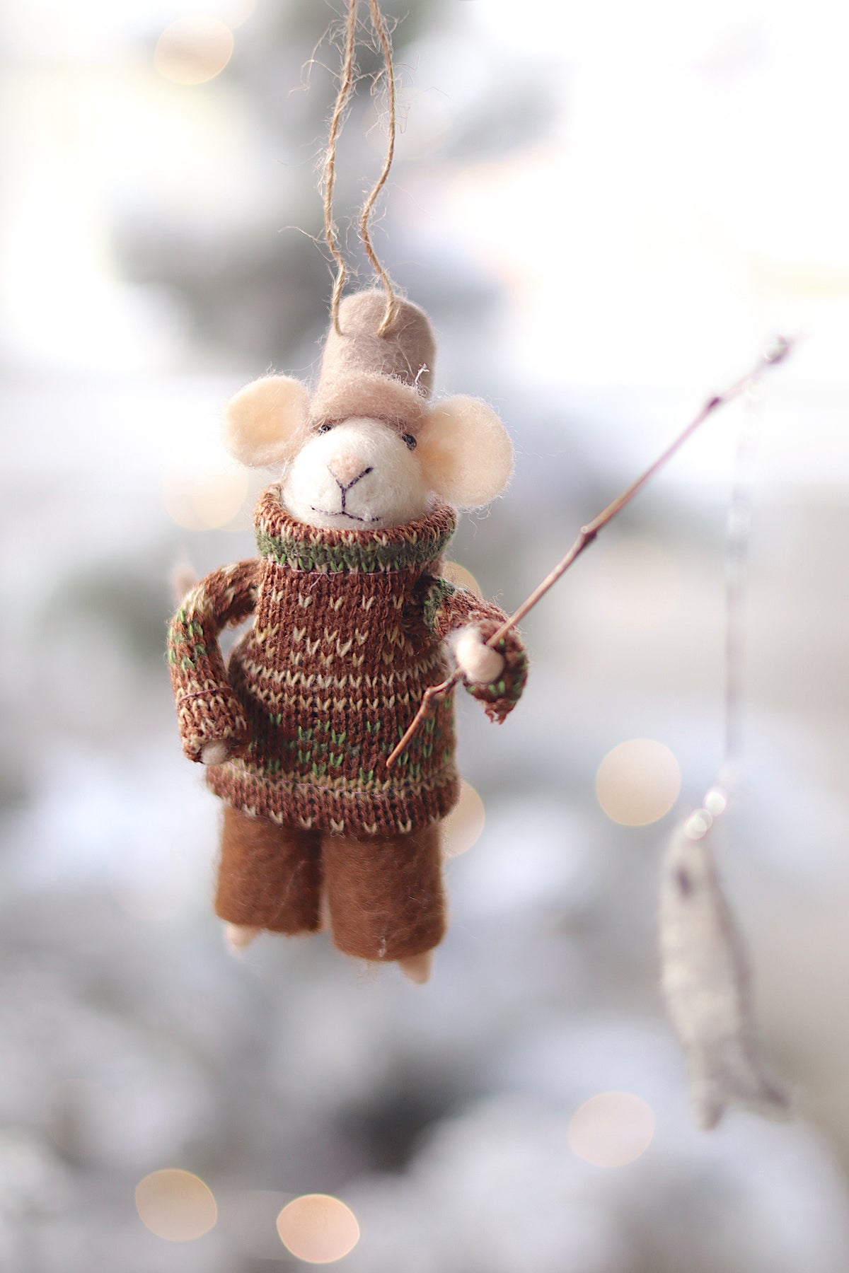 lifestyle view of fisherman frank Outdoor Holiday Mouse Ornament - 10 Options at Maison garçonne