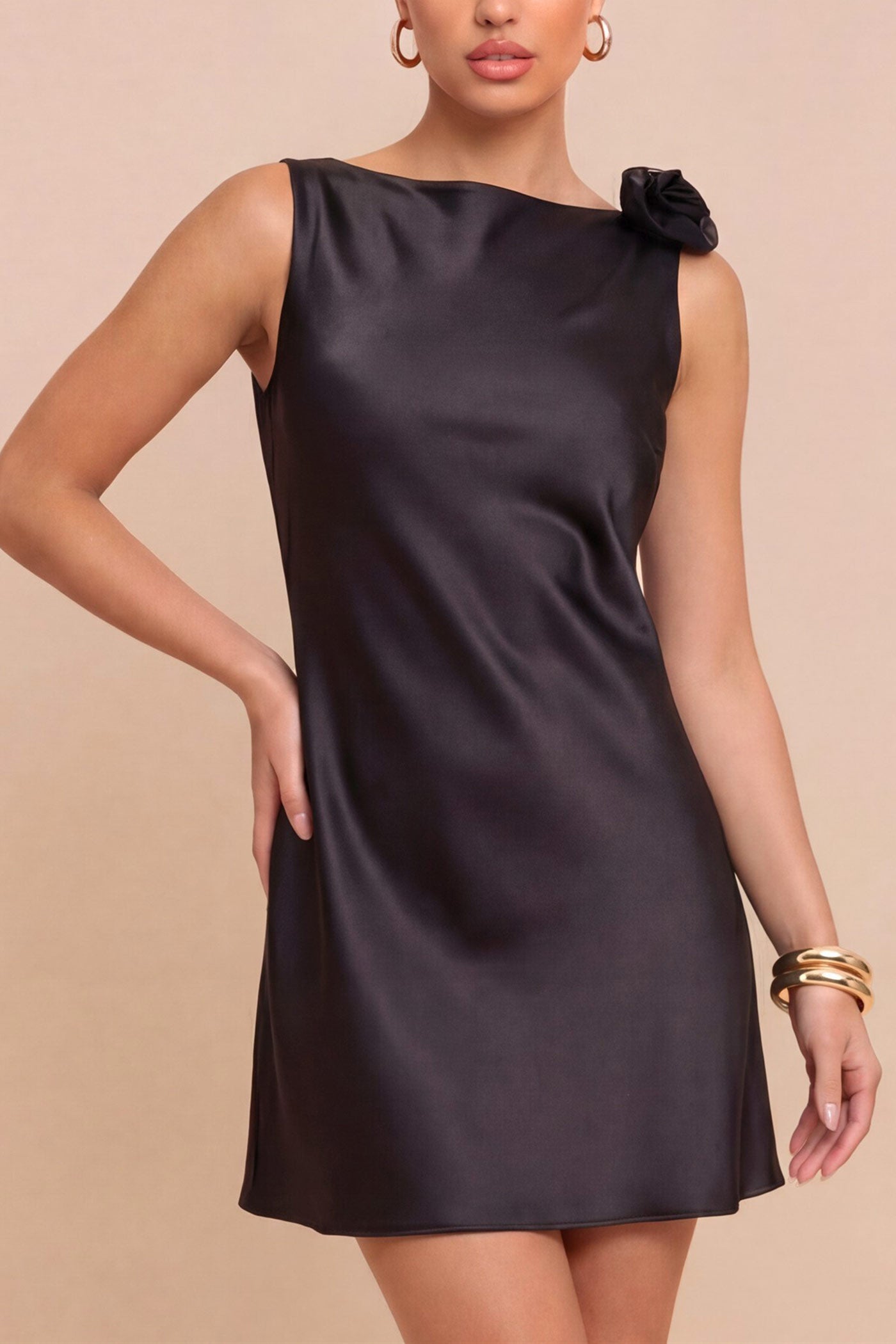 front view of a woman wearing Abdela Black Satin Short Dress with Low Open Back from Boutique 1861 