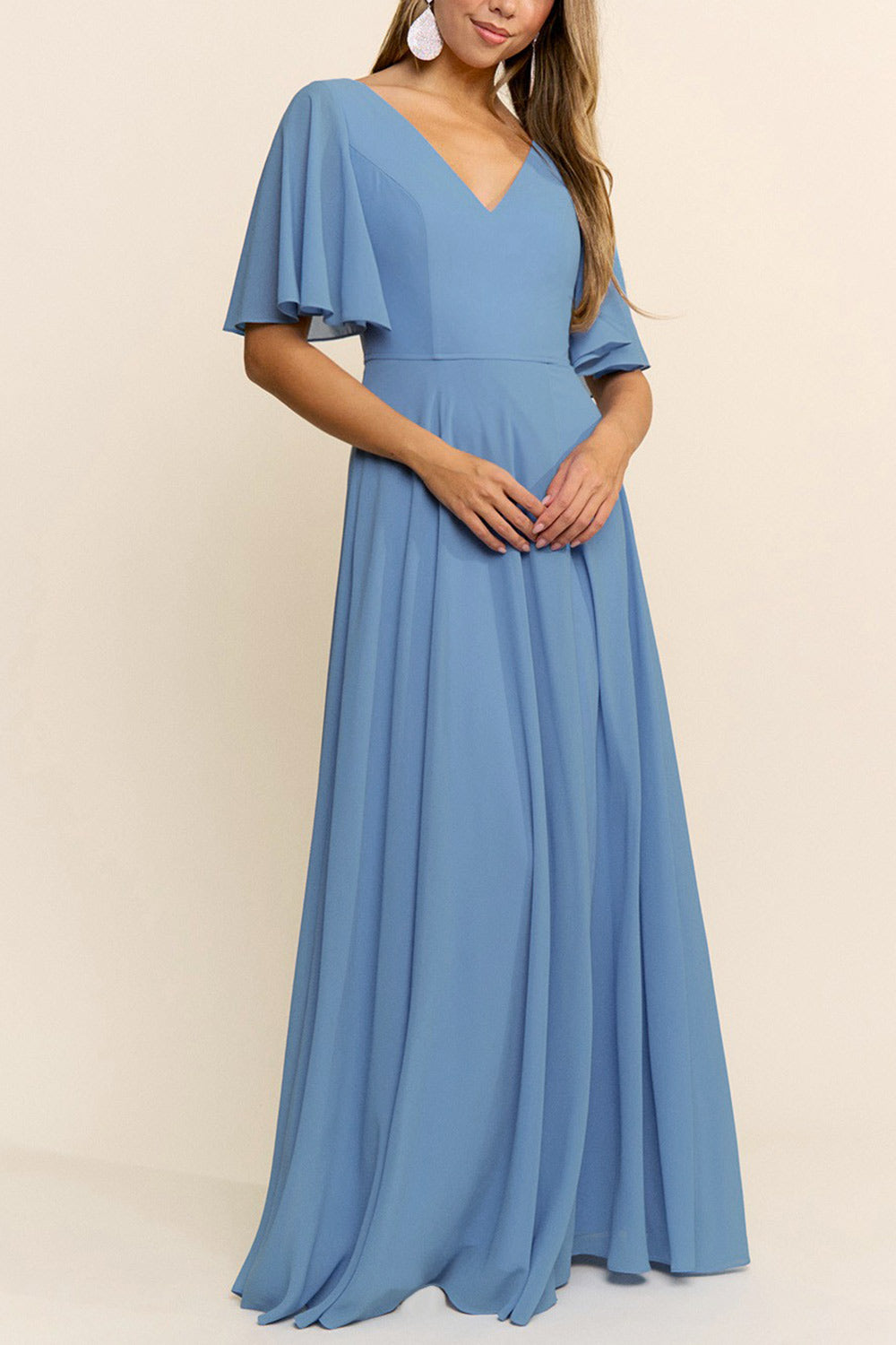 woman wearing  Adelphia Blue V-Neck Chiffon Maxi Dress from Boutique 1861