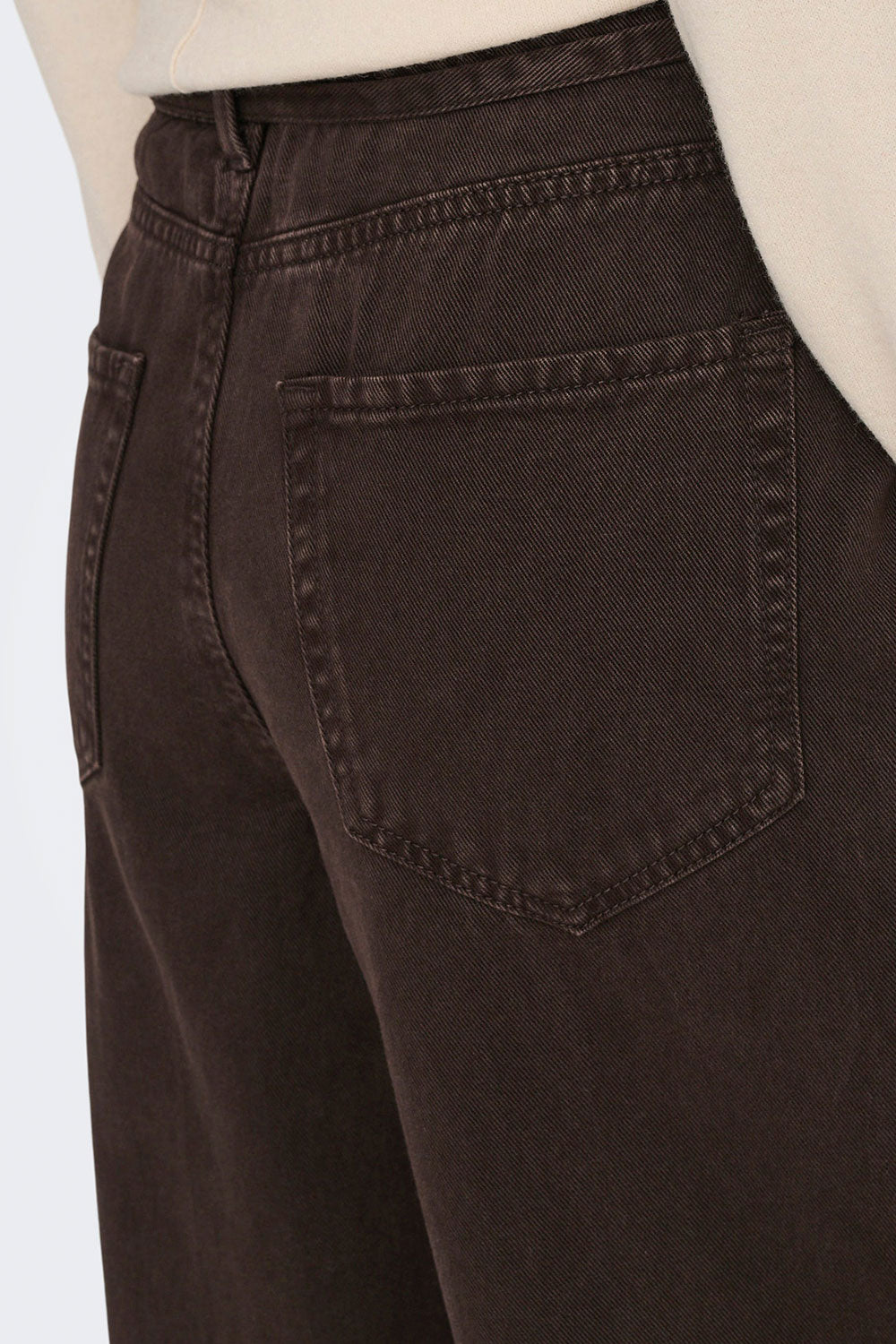 woman wearing Anvers Brown Denim Ballon Fit Pants | La petite garçonne back view
