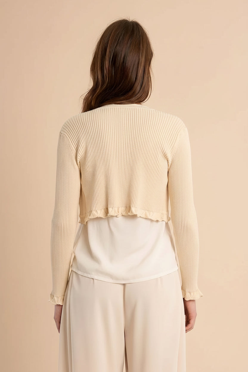 woman wearing Averie Beige Cropped Knit Bolero with Scalloped Edges from boutique 1861.