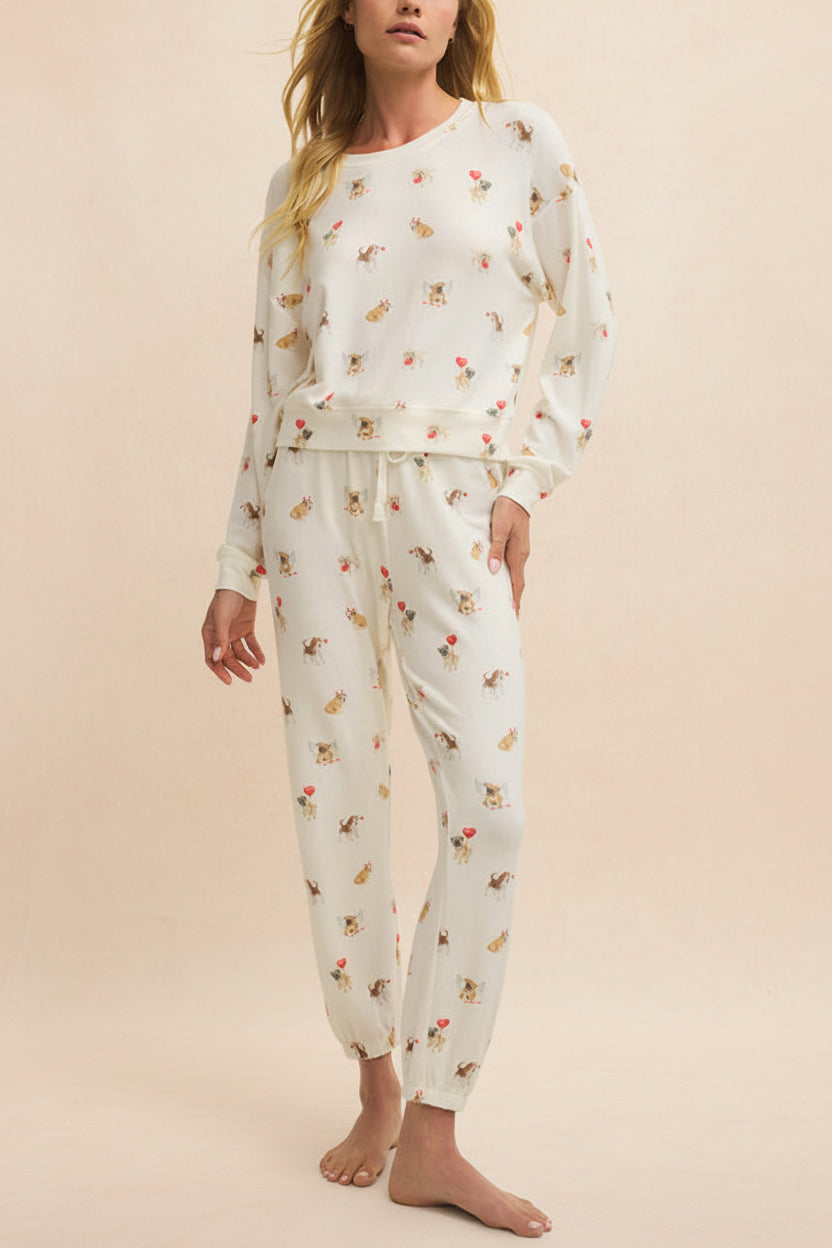 woman wearing Ballari White Jogger Pants with Dog Print from La petite garçonne