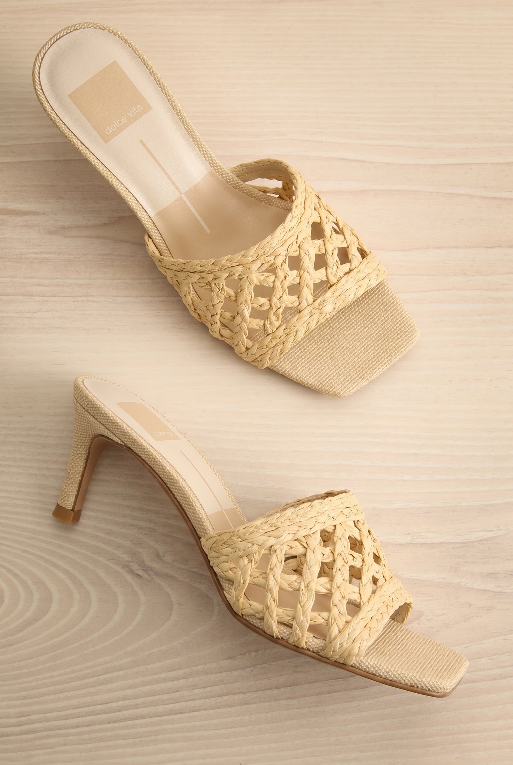 Pair of Dolce Vita Boween beige Braided Faux Leather Kitten Heel Mules from la petite garçonne.