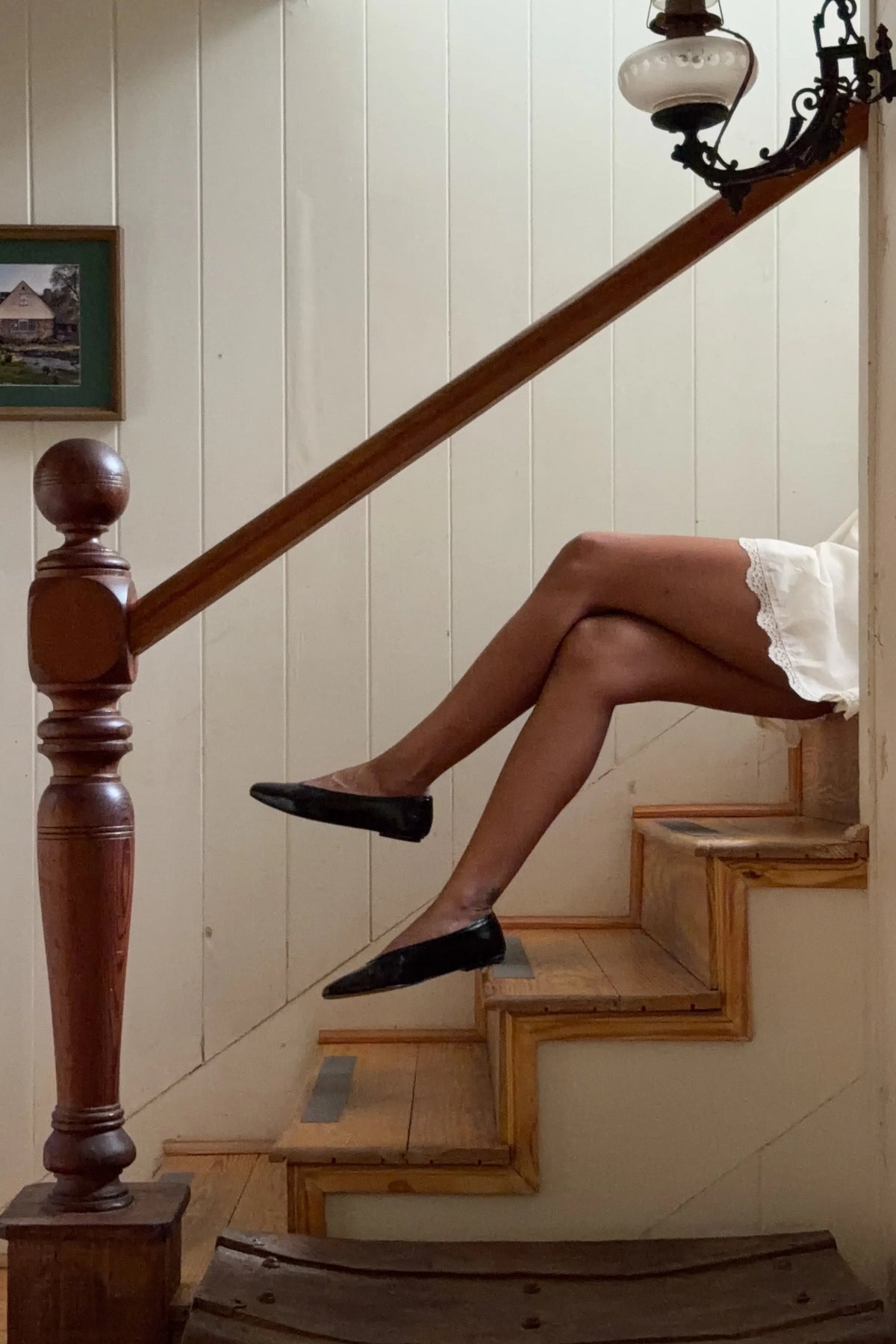 les of a woman wearing Caret Black Leather Square Toe Ballet Flats from La petite garçonne