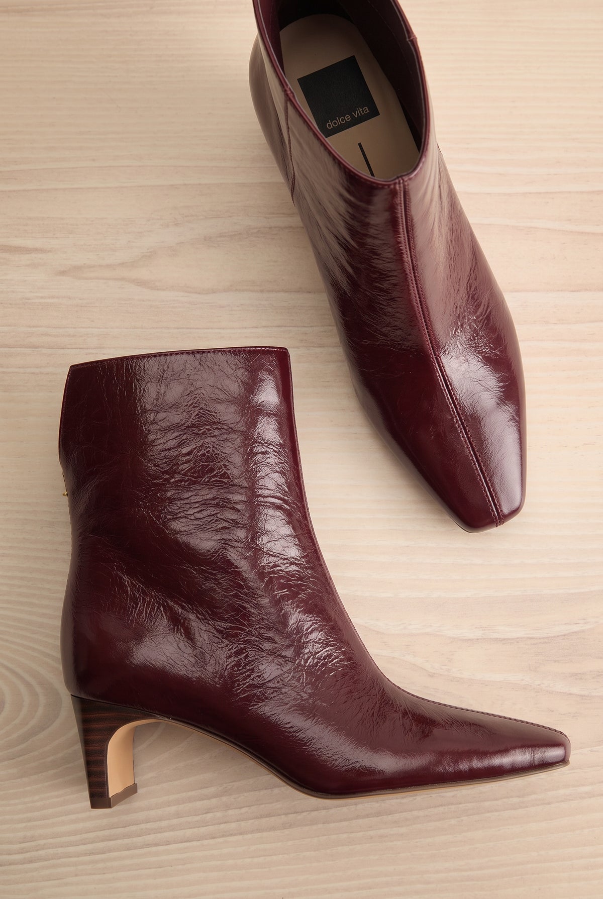A pair of pointed-toe Bennet Burgundy  Leather Ankle Boots from Dolce Vita at la petite garçonne in Montreal