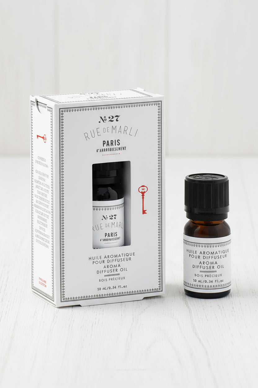 Rue de Marli Diffuser Oil bottle and packaging on a white background