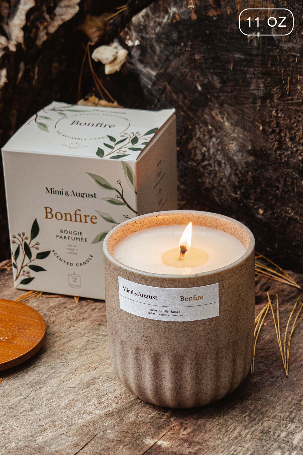 Bonfire 11 0z Reusable Candle with the enchanting scent of cedarwood and smoked vanilla from Mimi & August 