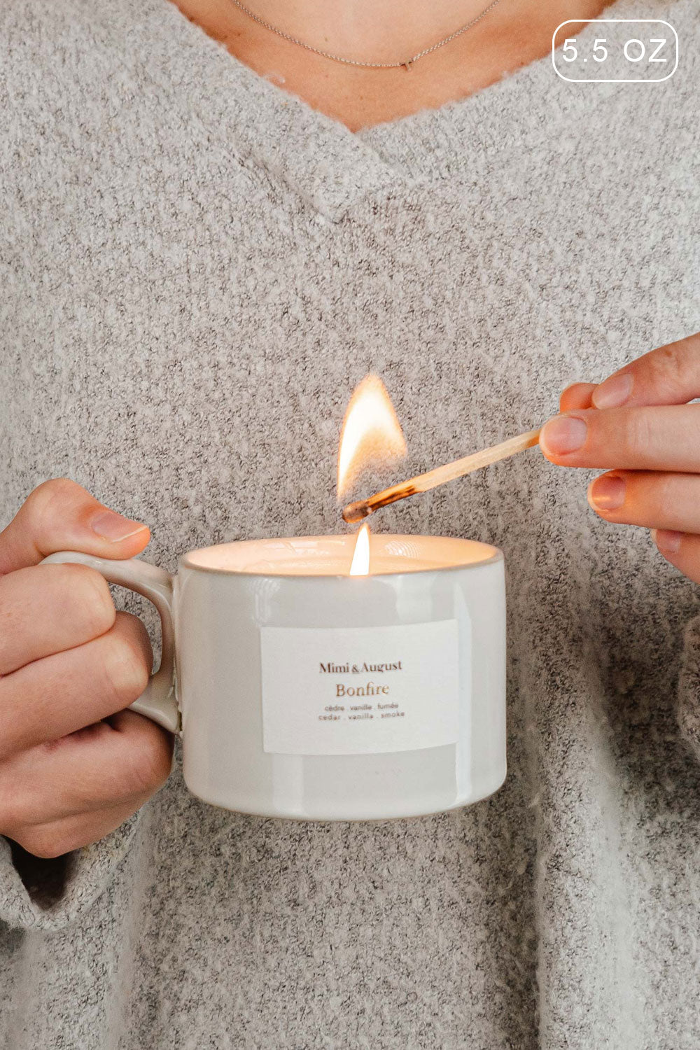 Bonfire 5.5 0z Reusable Candle with the enchanting scent of cedarwood and smoked vanilla from Mimi & August 