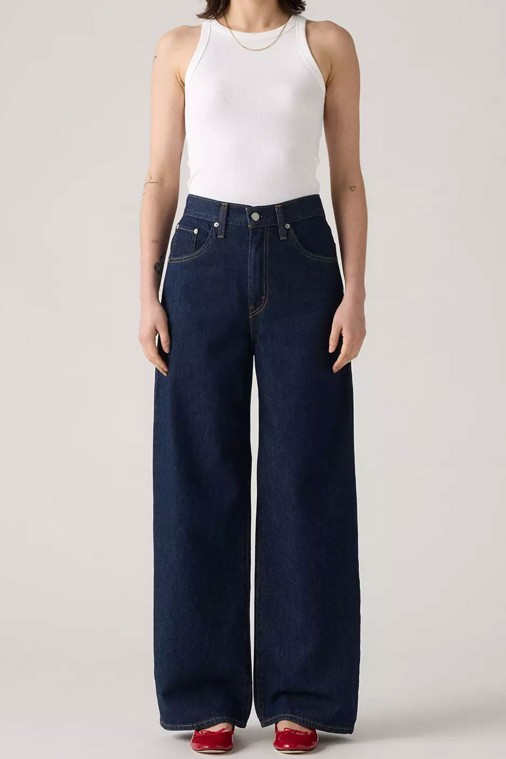 Person wearing Braga Dark Wash High-Waisted front from La petite garçonne