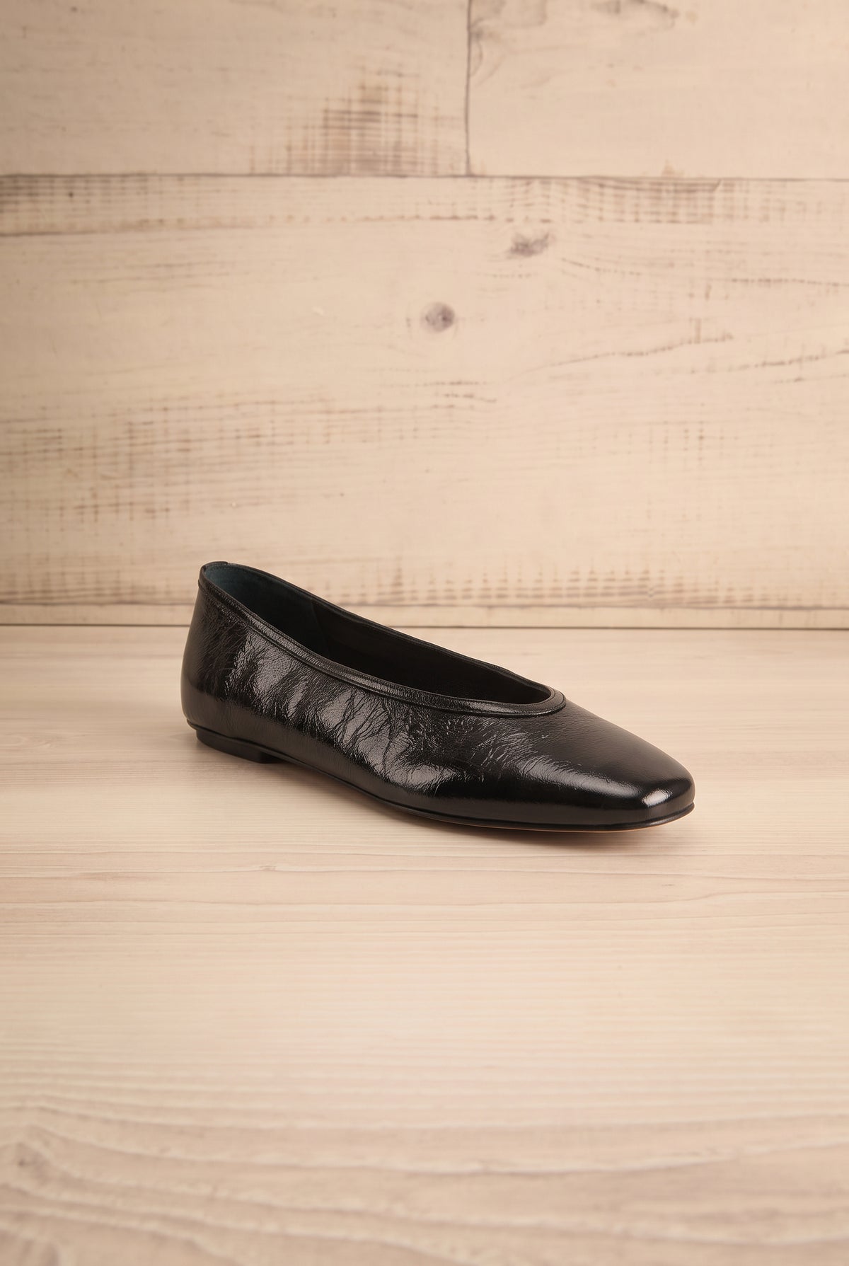 front view of Caret Black Leather Square Toe Ballet Flats at La petite garçonne