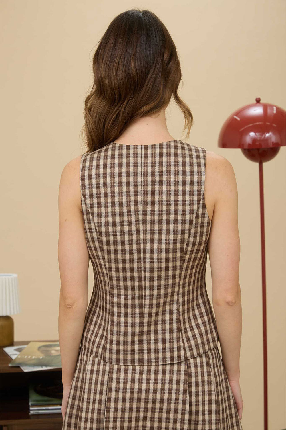 Person wearing Carince Brown Plaid Button Down Vest from La petite garçonne  back