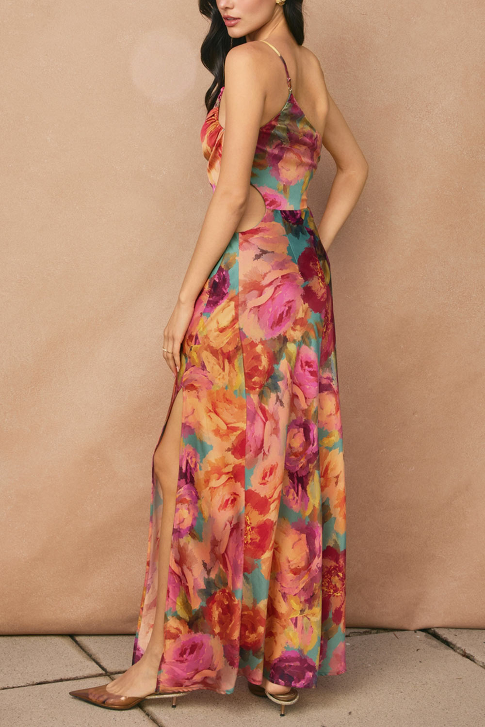 back of a woman wearing Carleena Vibrant Floral Satin Dress with Cut-Out from Boutique 1861 