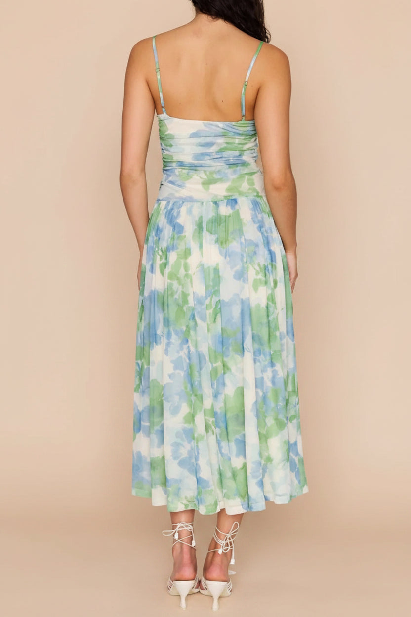 back of a woman wearing Carrye Drop-Waist Floral Midi Dress from Boutique 1861