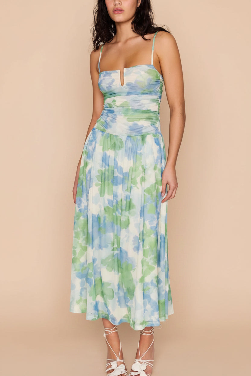 front of a woman wearing Carrye Drop-Waist Floral Midi Dress from Boutique 1861
