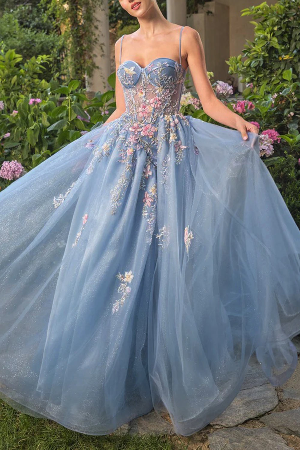woman wearing Cecily Crystal Embroidered Blue Ball Gown Dress from Boutique 1861