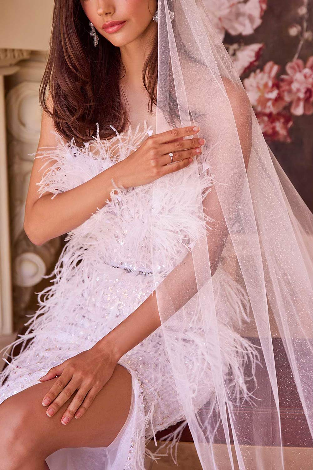 close-up of a woman wearing Celestia Long Sparkling White Veil from Boudoir 1861