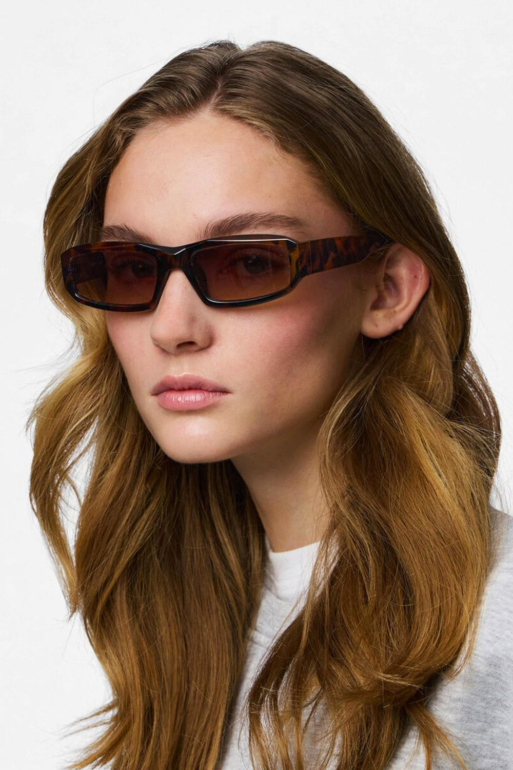 woman wearing Atul Brown Tortoise Shell Rectangular Sunglasses from La petite garçonne 