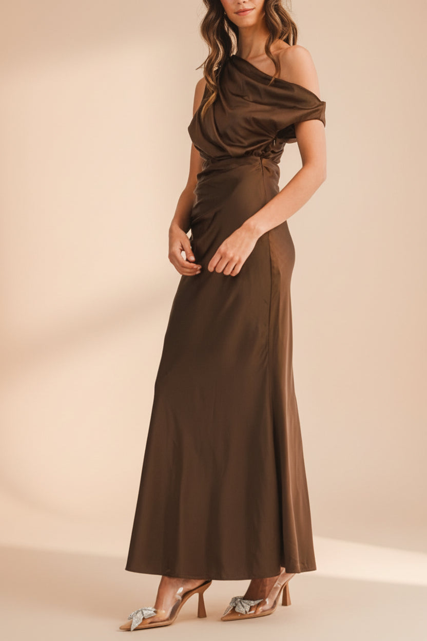 Side view of a woman wearing Colleen Brown Asymmetrical Satin Dress from boutique 1861