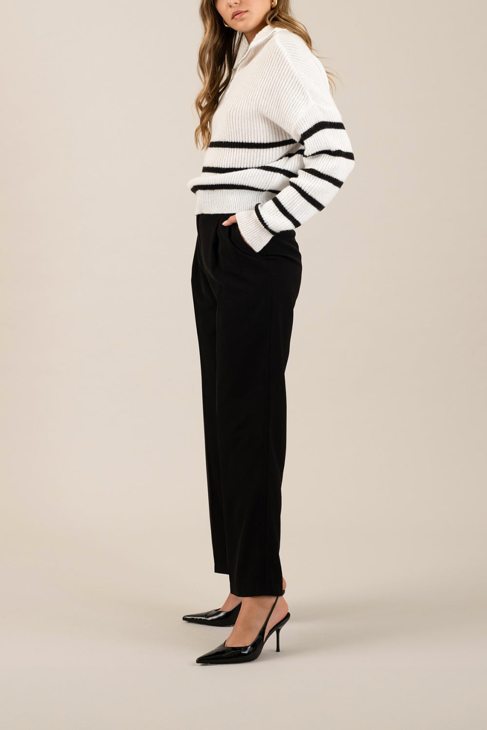 side view of a woman wearing Cortona Black Straight-Leg Pants with Pleats from La petite garçonne 