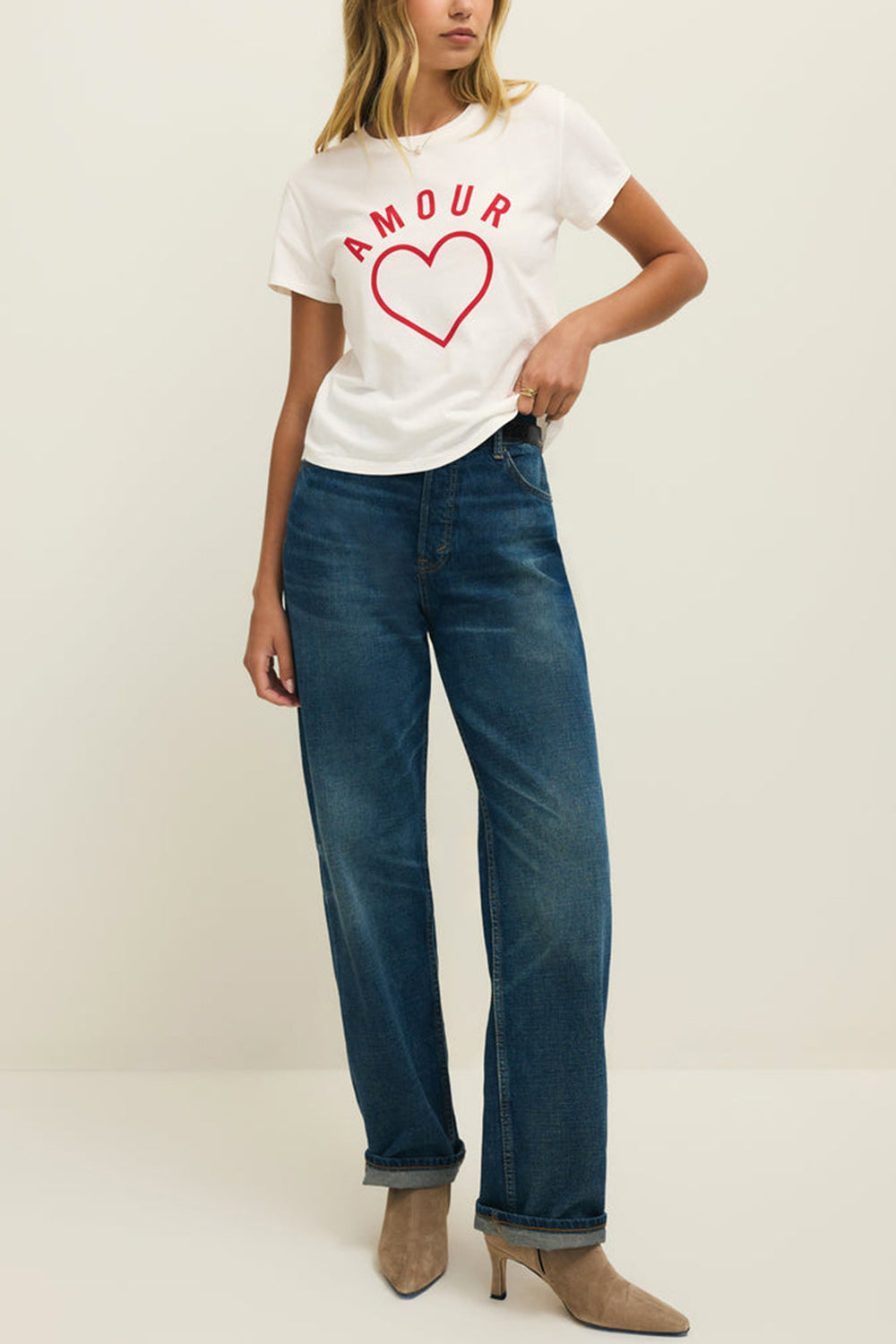 front of a woman wearing Cupids White T-Shirt with Red Heart Motif from La petite garçonne 