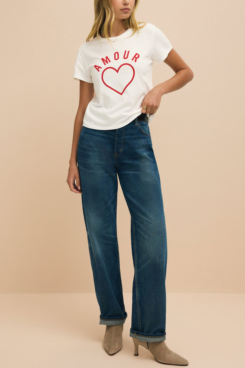 front of a woman wearing Cupids White T-Shirt with Red Heart Motif from La petite garçonne 