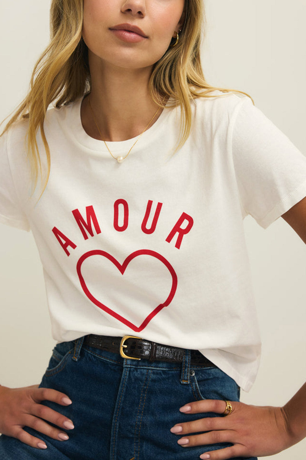 close-up of a woman wearing Cupids White T-Shirt with Red Heart Motif from La petite garçonne 