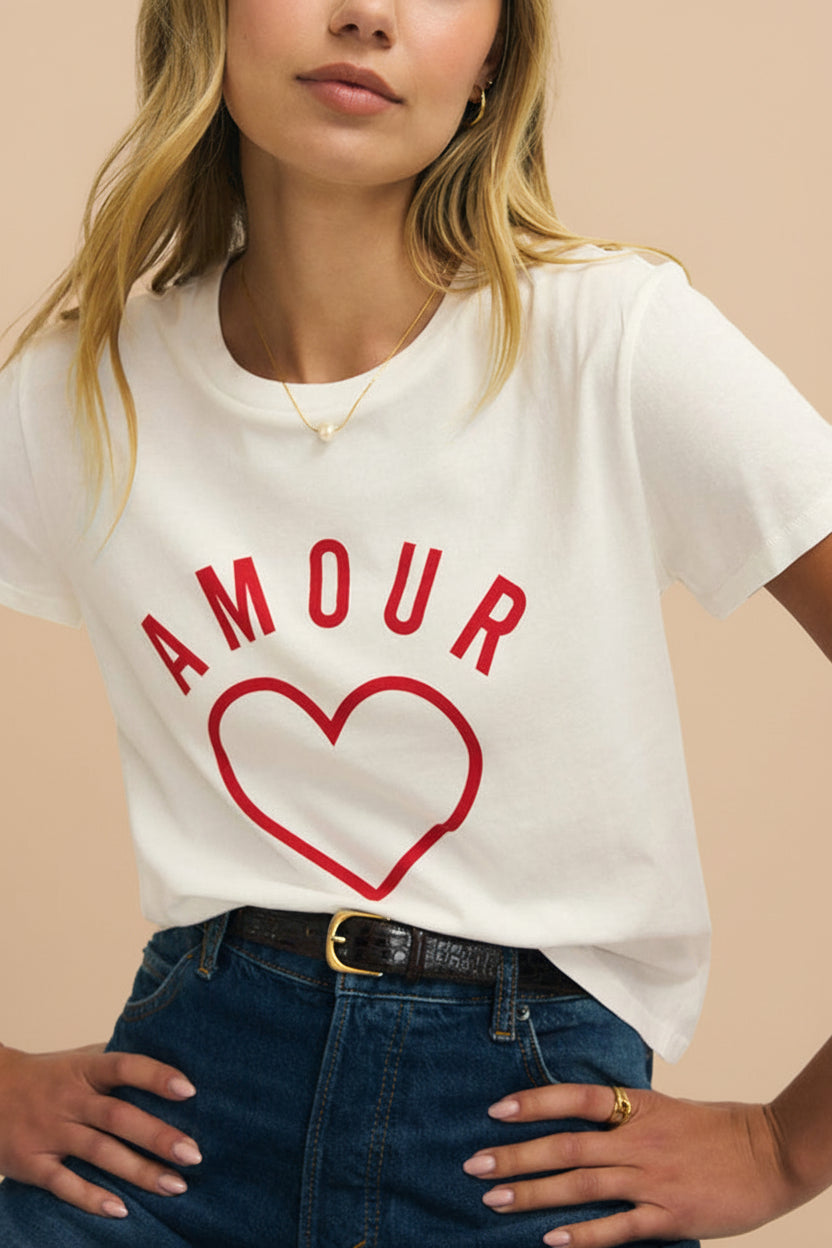 close-up of a woman wearing Cupids White T-Shirt with Red Heart Motif from La petite garçonne 
