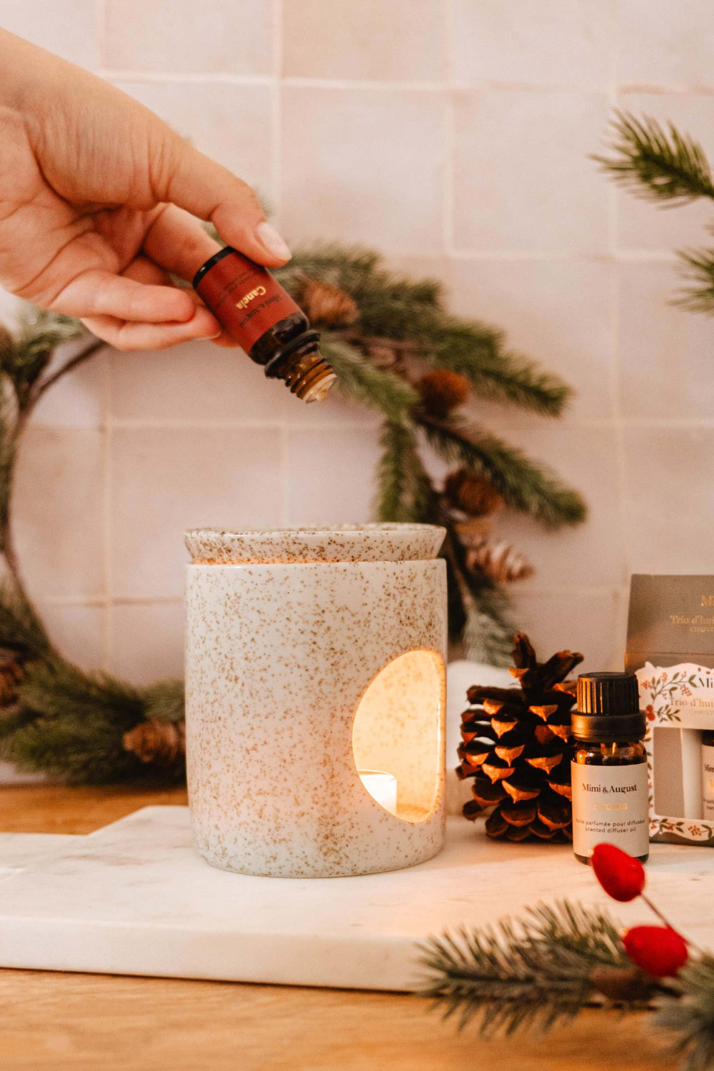 Canela Christmas Scented Oils bottle by Mimi and August.