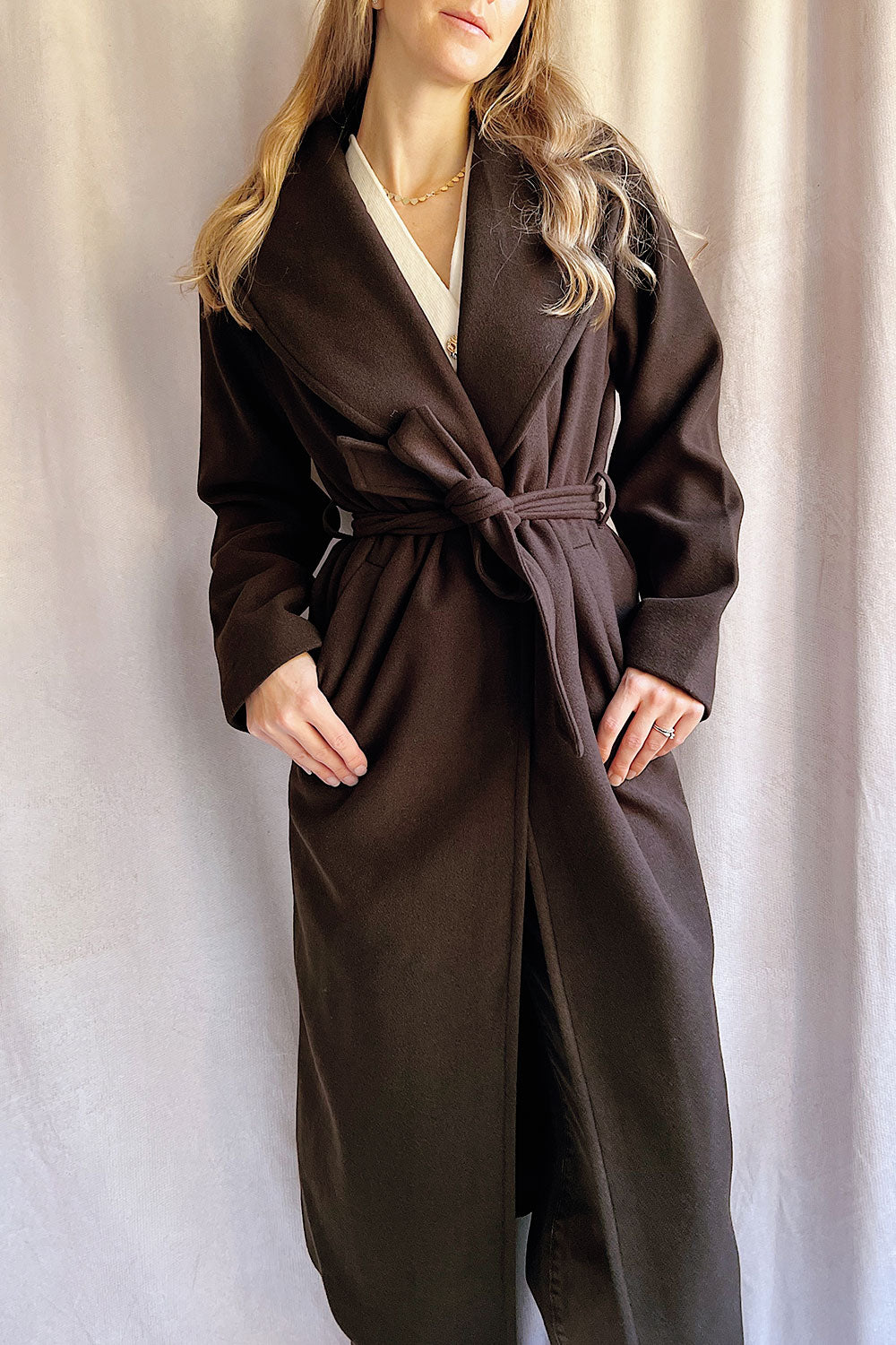 Woman wearing Parma Long Brown Coat with Belt from La petite garçonne oepn