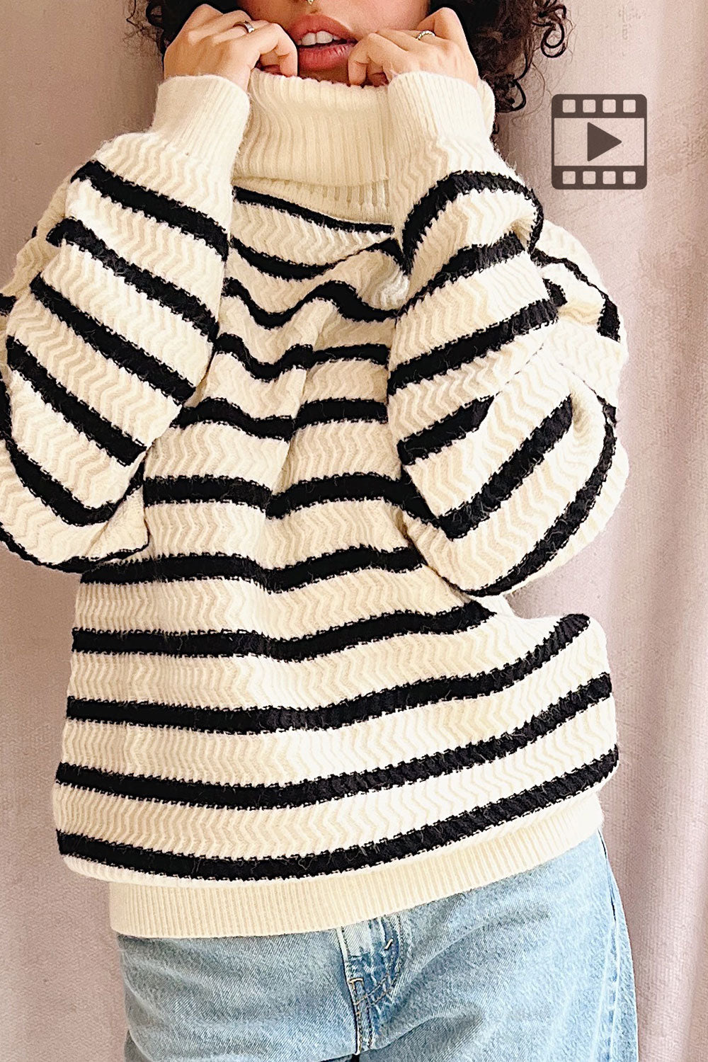 Person wearing Arcot Striped Knit Turtleneck Sweater from La petite garçonne