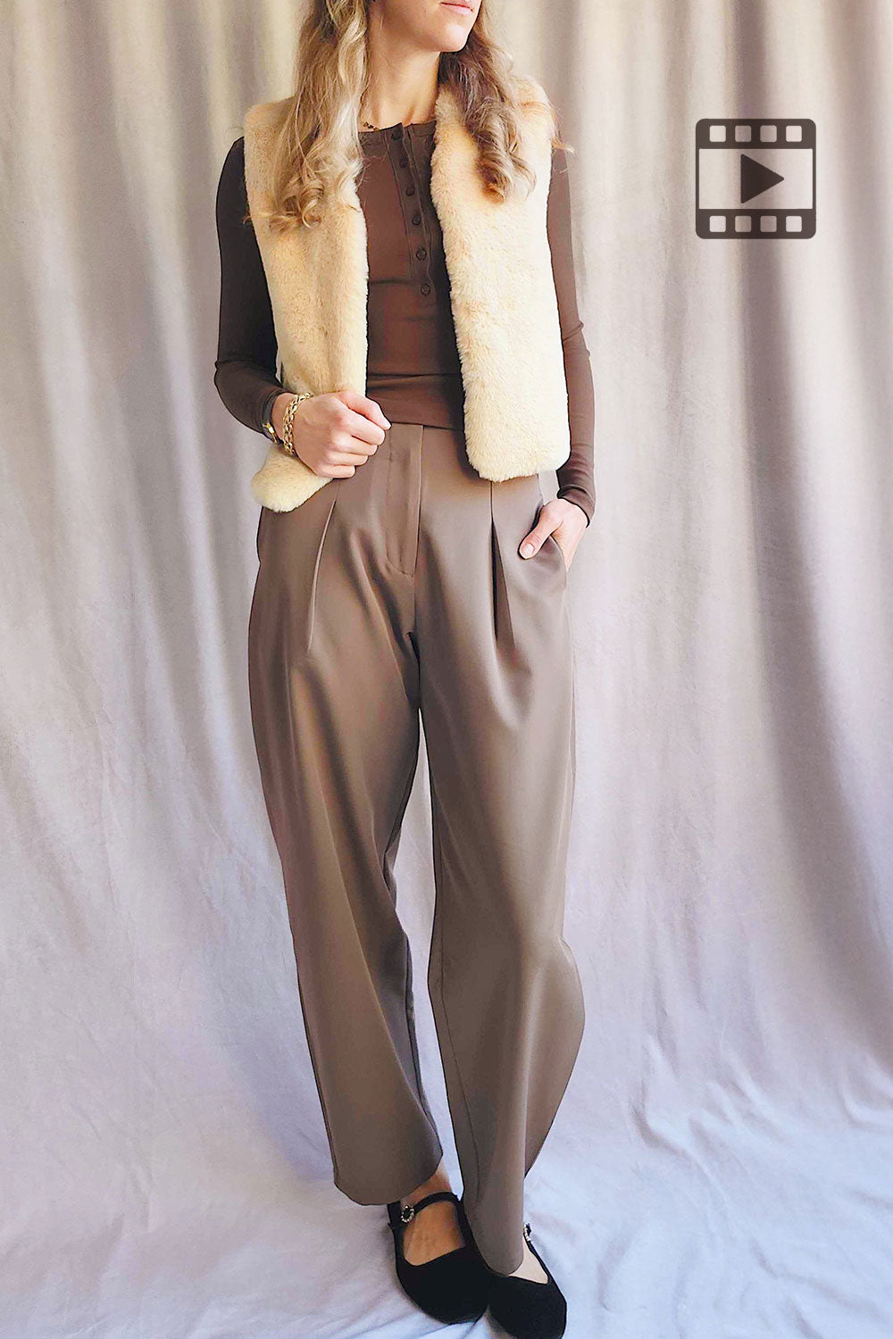 Person wearing Guadaira Beige Faux Fur Sleeveless Vest from La petite garçonne