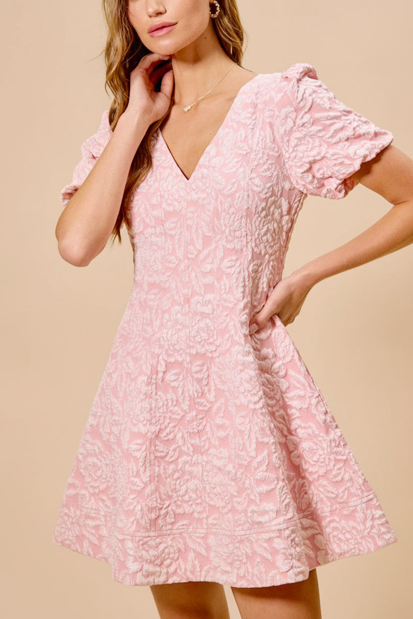 front of a woman wearing Deedee Pink Floral Short Dress with Puff Sleeves from Boutique 1861 front view