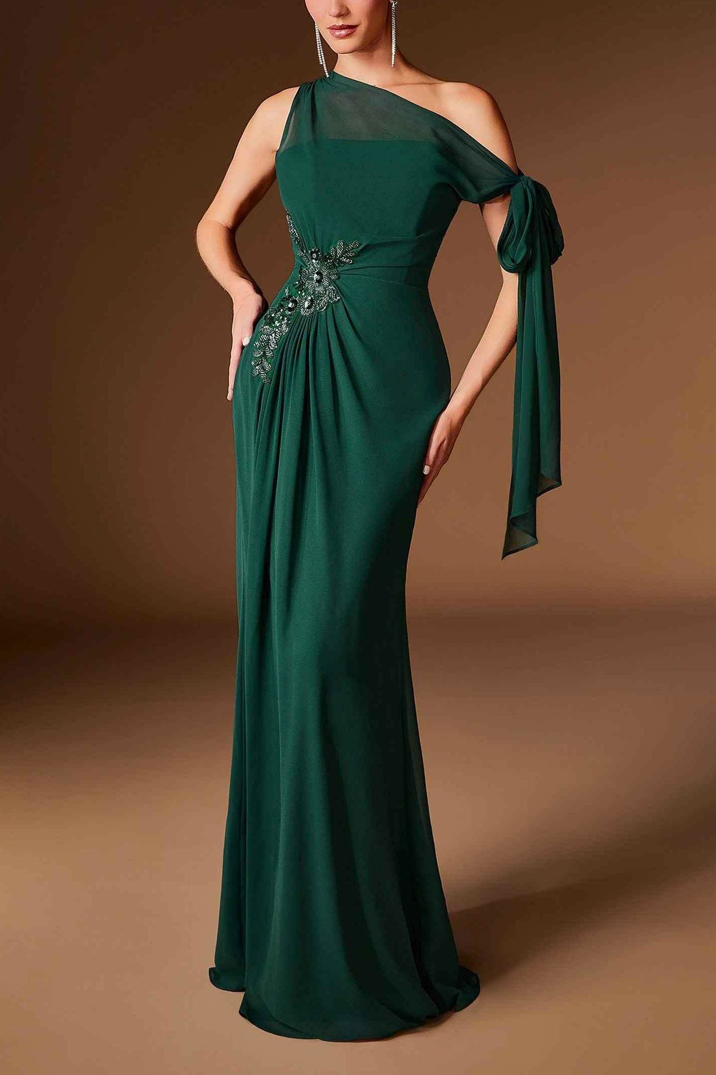 front view of a woman wearing Devica Green One-Shoulder Beaded Chiffon Maxi Dress from Boutique 1861