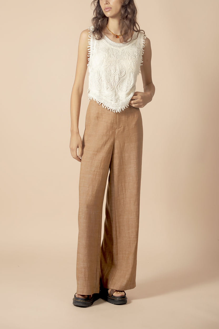 front view of a woman wearing Dhamtari Beige Sheer Tank Top with Fringe | La petite garçonne