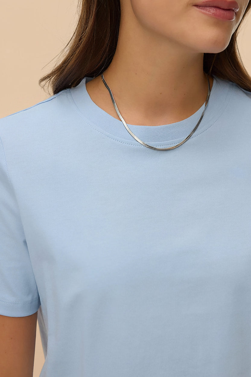 close-up of a woman wearing Dumka Light Blue Cotton T-Shirt with Short Sleeves from La petite garçonne