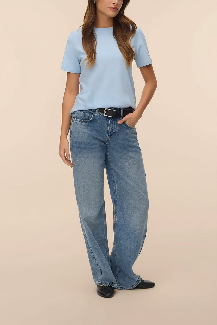 view of a woman wearing Dumka Light Blue Cotton T-Shirt with Short Sleeves from La petite garçonne