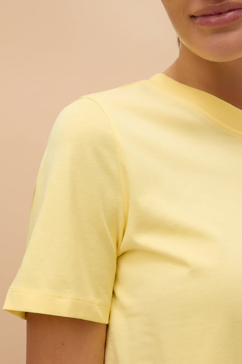 close-up of a woman wearing Dumka Yellow Cotton T-Shirt with Short Sleeves from La petite garçonne
