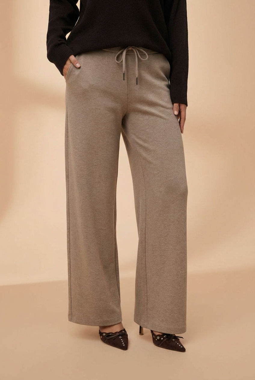 front view of a woman wearing Daman Taupe Wide Leg Pants from La petite garçonne 