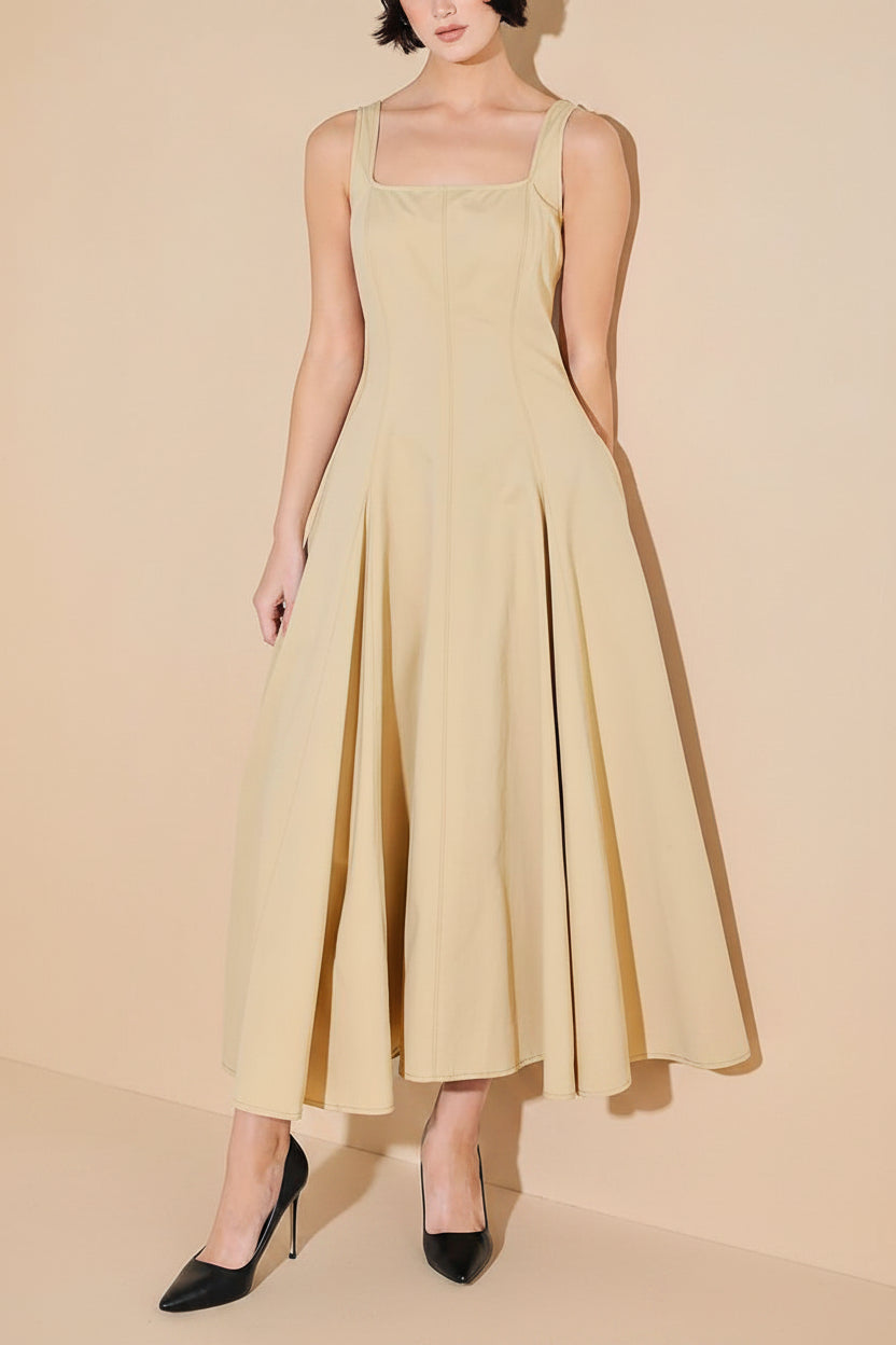 view of a woman wearing Elynor Beige Midi Dress with Pockets from Boutique 1861