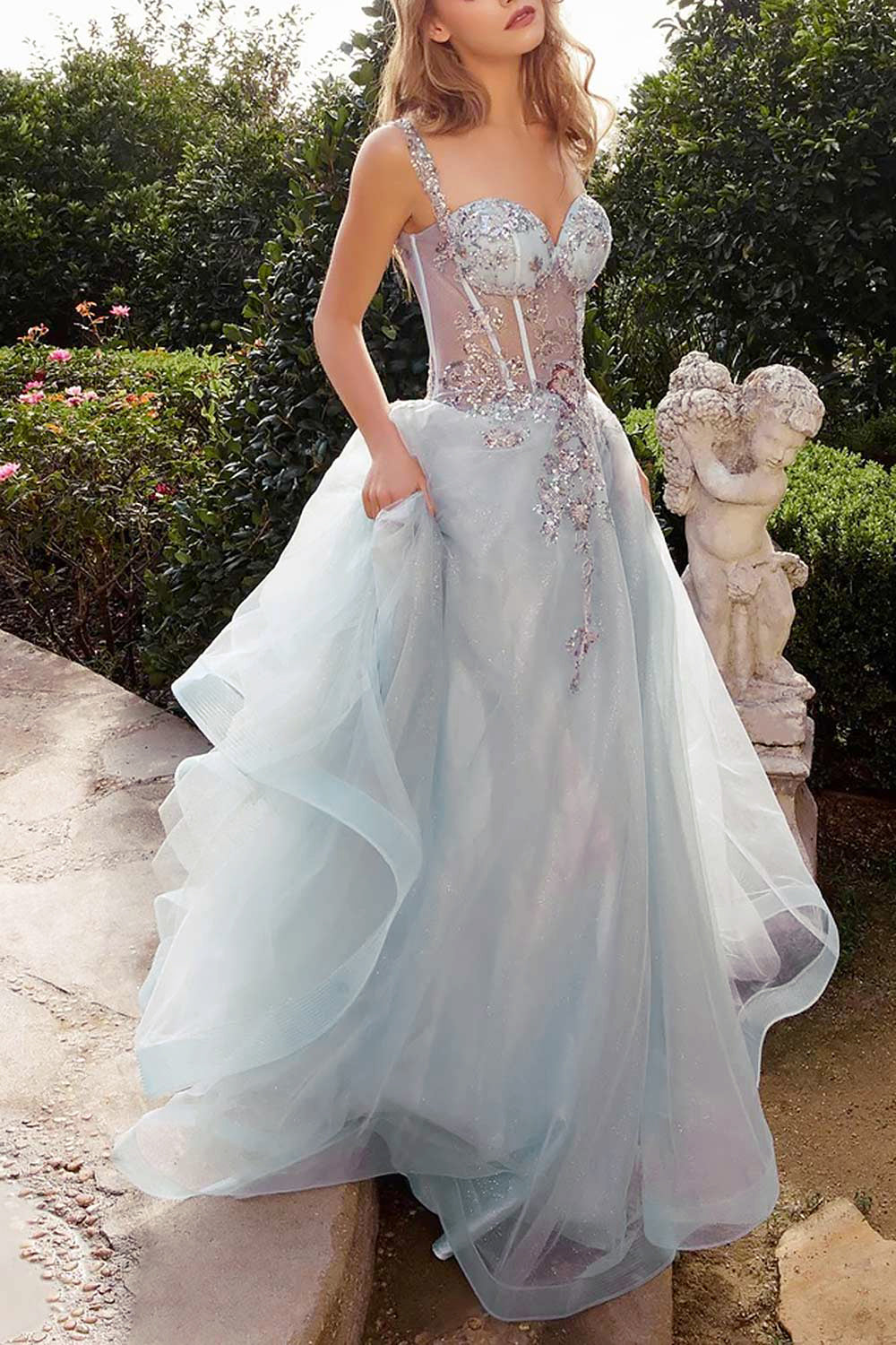 woman outside wearing Emerie Blue Translucent A-Line Corset Dress from Boutique 1861