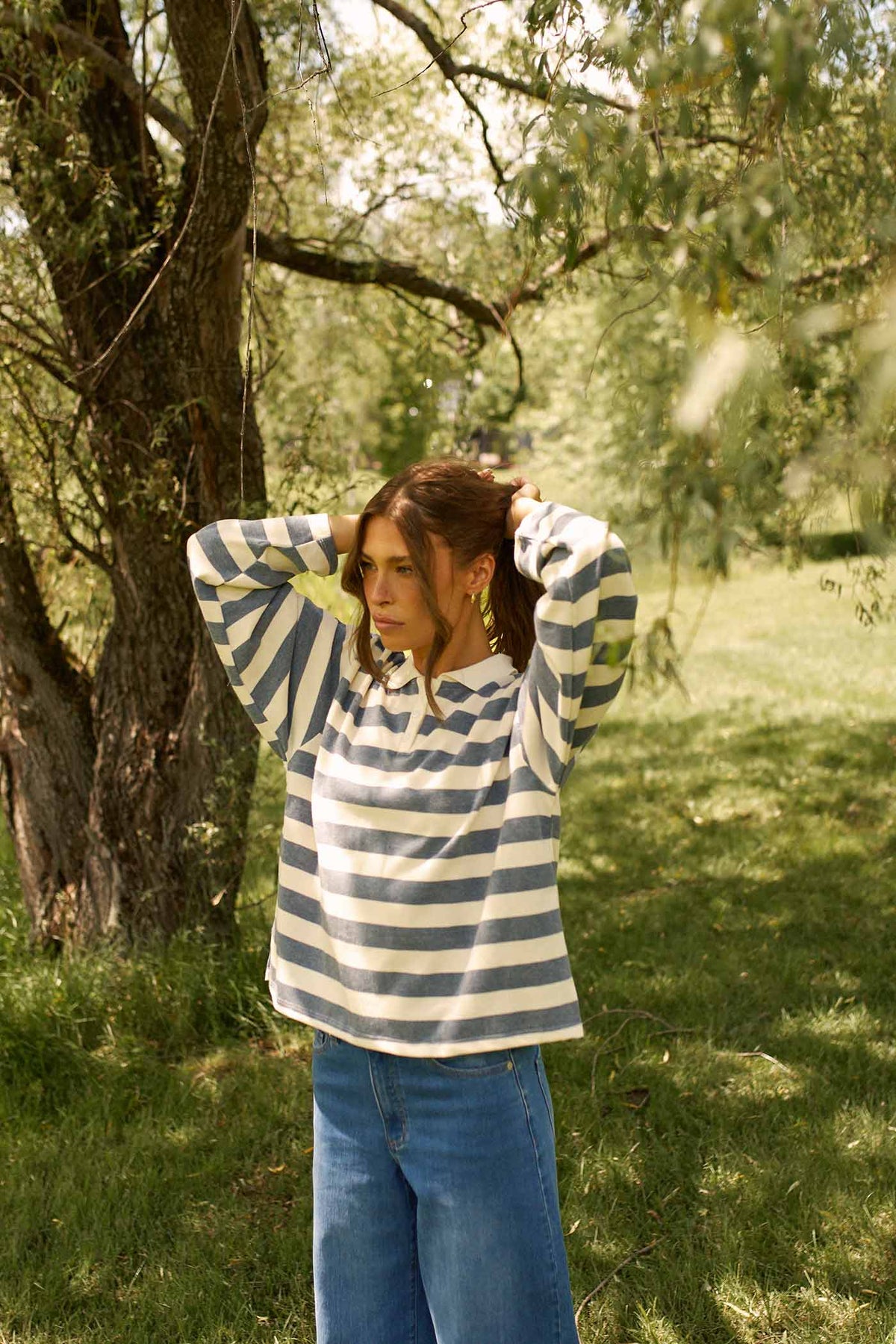 woman wearing Zember Blue Stripped Oversized Polo Top by Dailystory from La petite garçonne