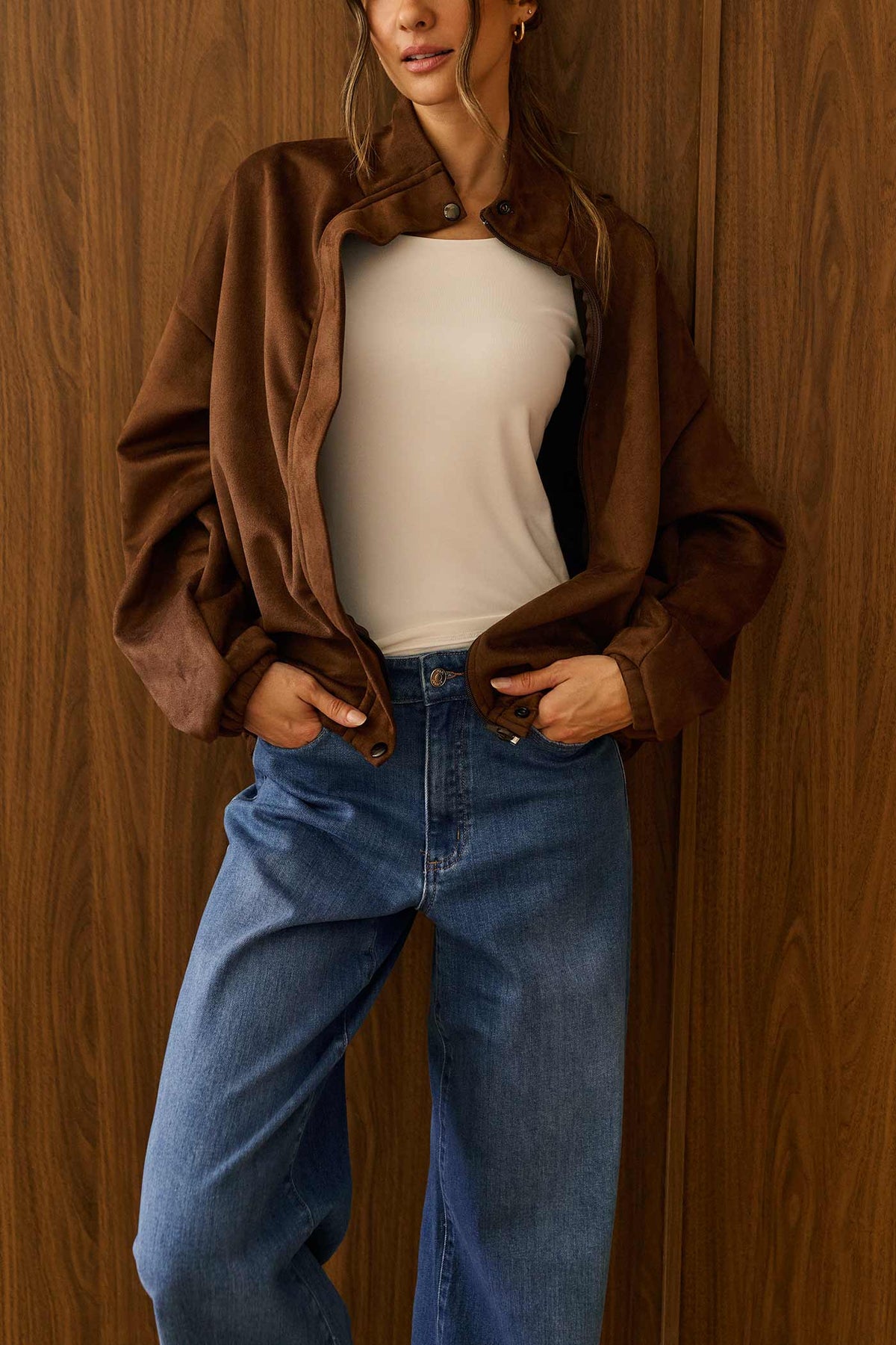 view of a woman wearing Dailystory Enya Bomber Brown Faux Suede Oversized Jacket at La petite garçonne