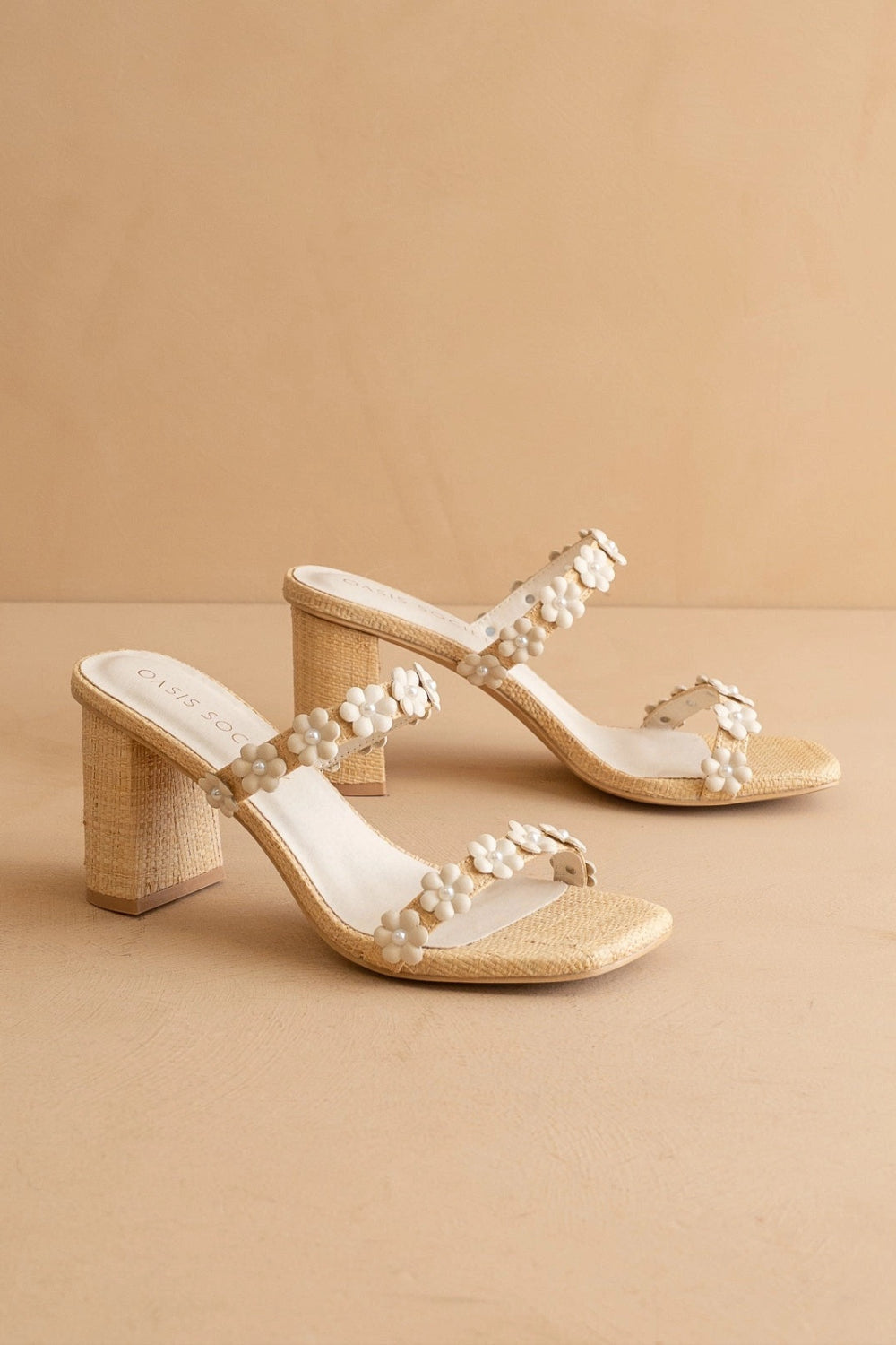 side shot of Feliza Raffia Block Heel Sandals with Floral Appliqués | La petite garçonne